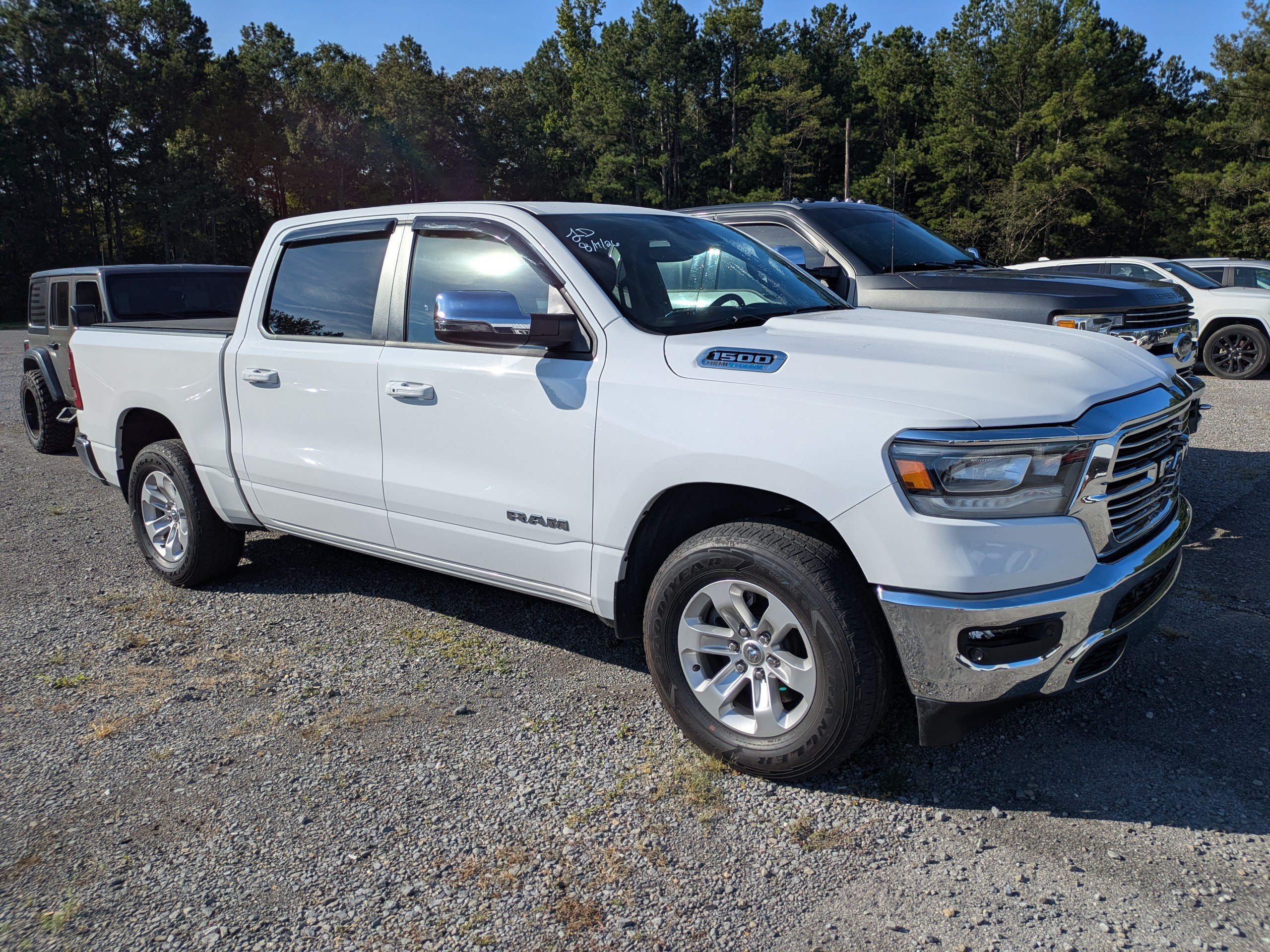 Used 2024 Bright White Clearcoat Ram Laramie image 1