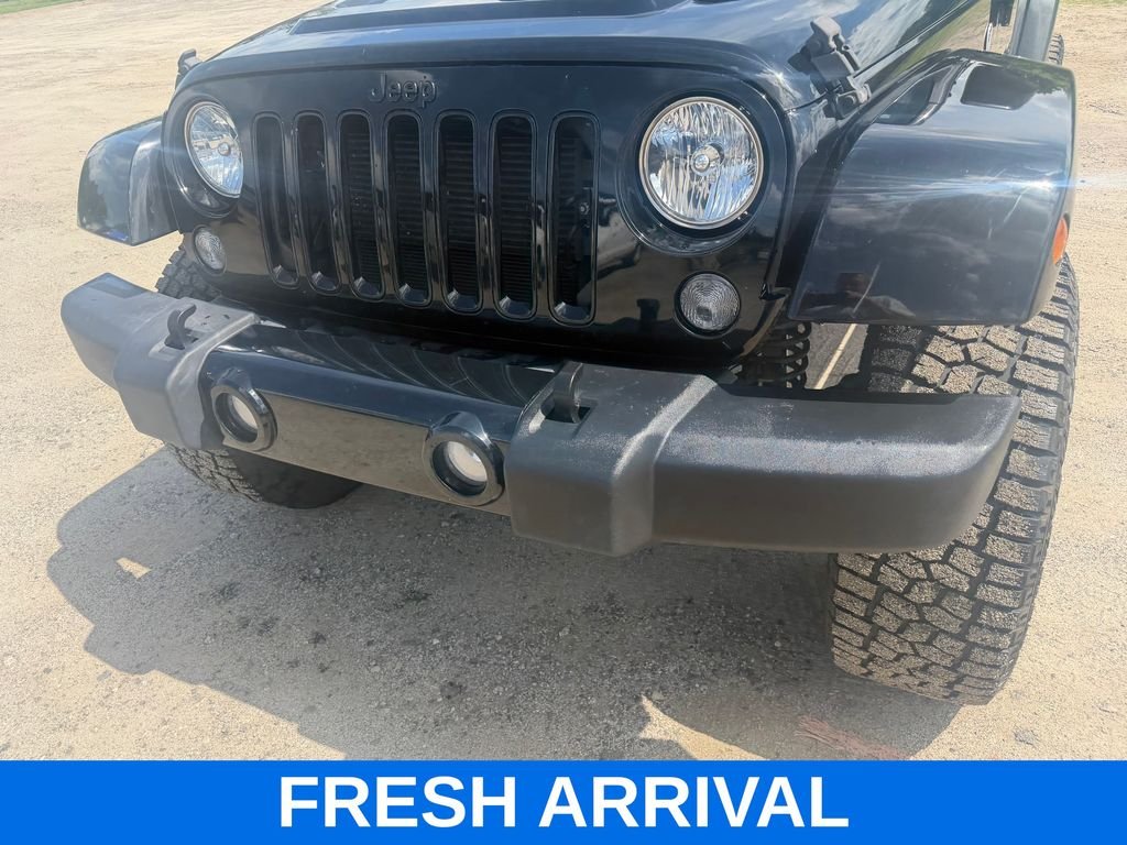 Used 2015 Black Jeep Unlimited Sahara Altitude image 5