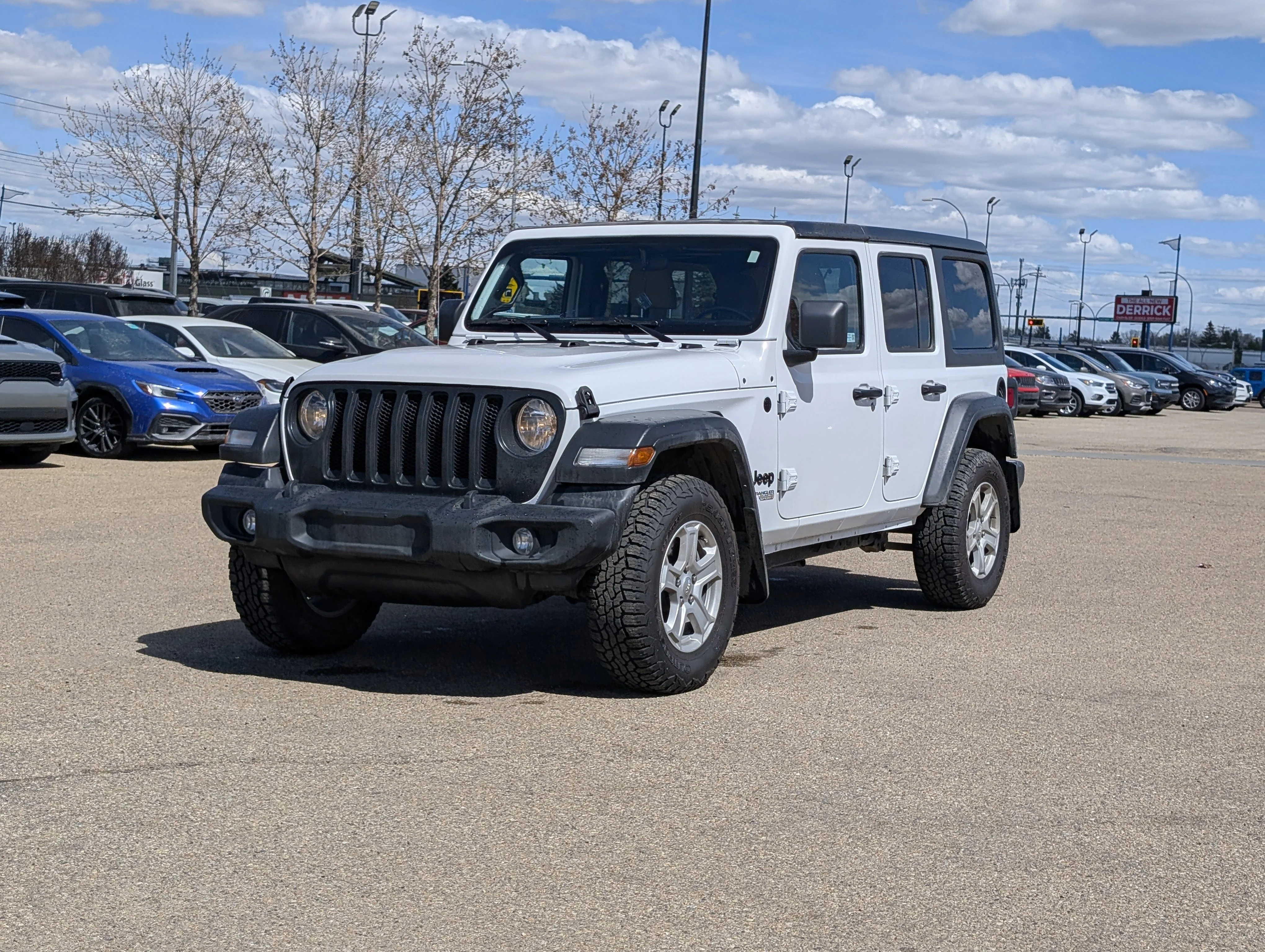 Used 2021 Bright White Jeep Unlimited Sport image 2