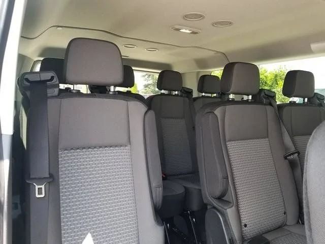 New 2026 Oxford White Ford Passenger Van XLT image 8
