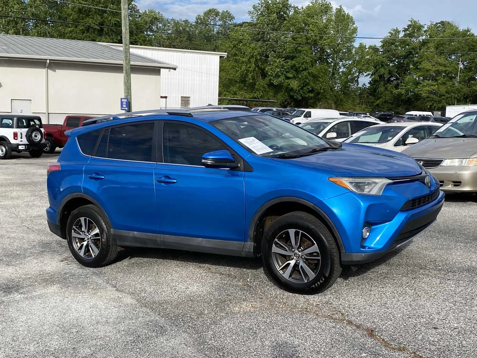 Used 2018 Toyota RAV4 XLE with VIN 2T3WFREV0JW420095 for sale in Auburn, AL
