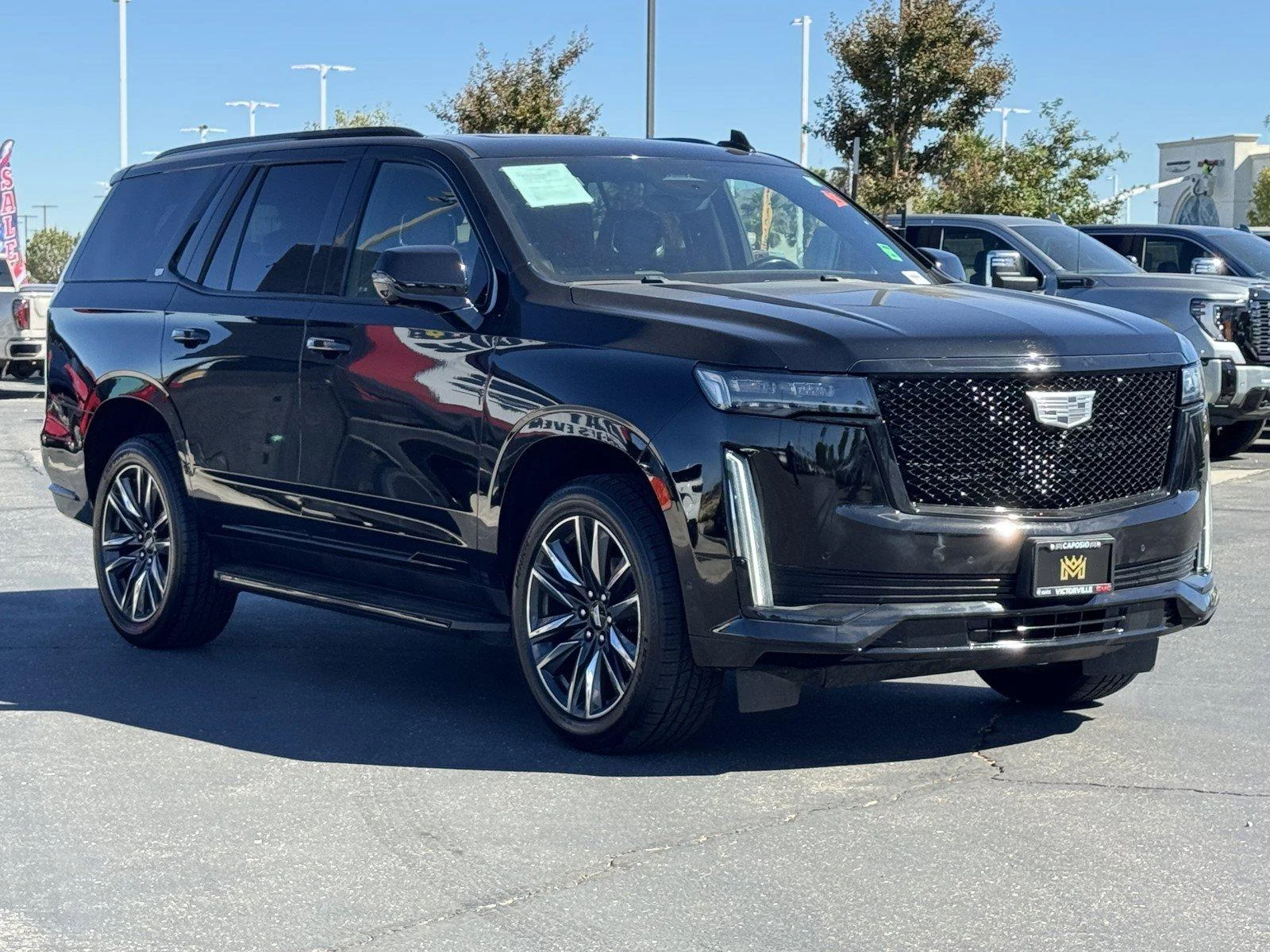 Used 2024 Black Raven Cadillac Sport image 1
