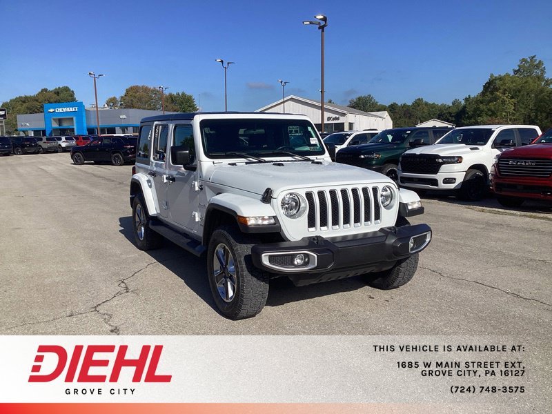 Used 2019 White Jeep Unlimited Sahara image 1
