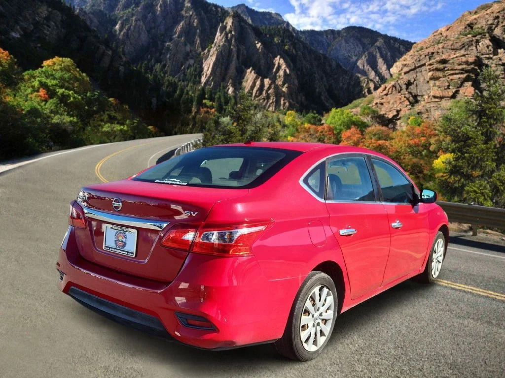 Used 2017 Red Nissan SV image 3