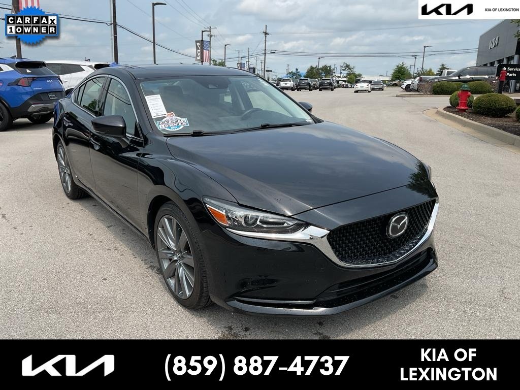 Used 2021 Jet Black Mica Mazda Touring image 1