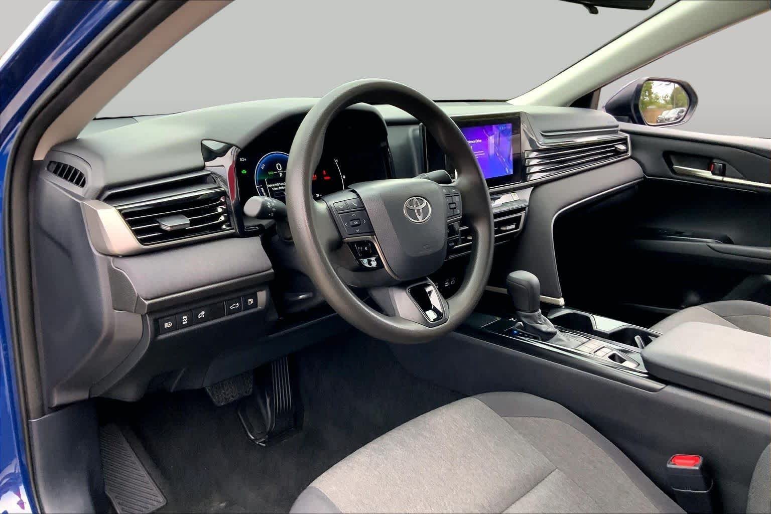 Used 2025 Reservoir Blue Toyota LE image 17