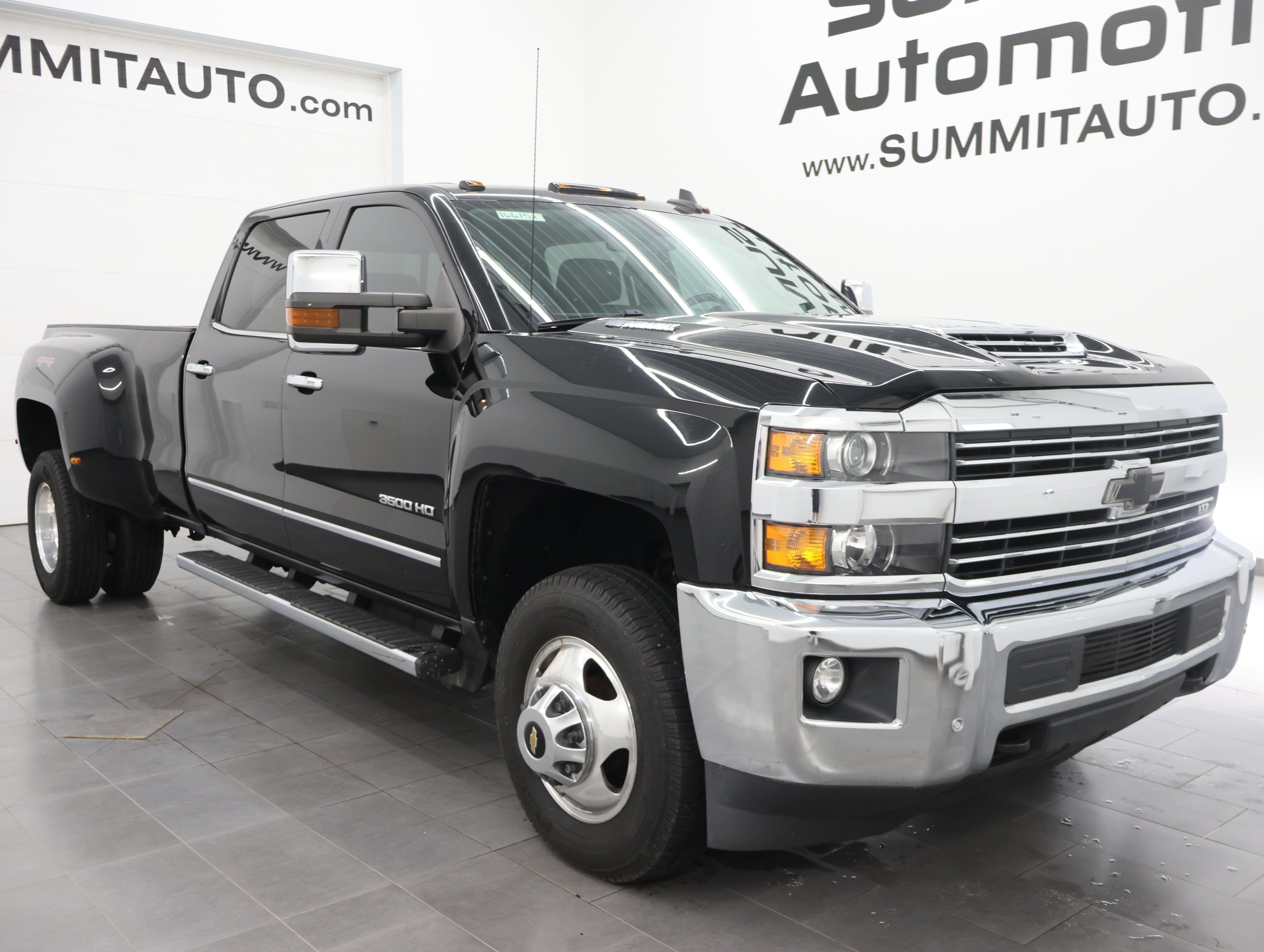 Used 2017 Black Chevrolet 4x4 Crew Cab LTZ DRW: CREW-LONG-DRW-LTZ-6.6L L5P DIESEL-NAV-HEAT/COOL SEATS-BACKUP CAM image 2