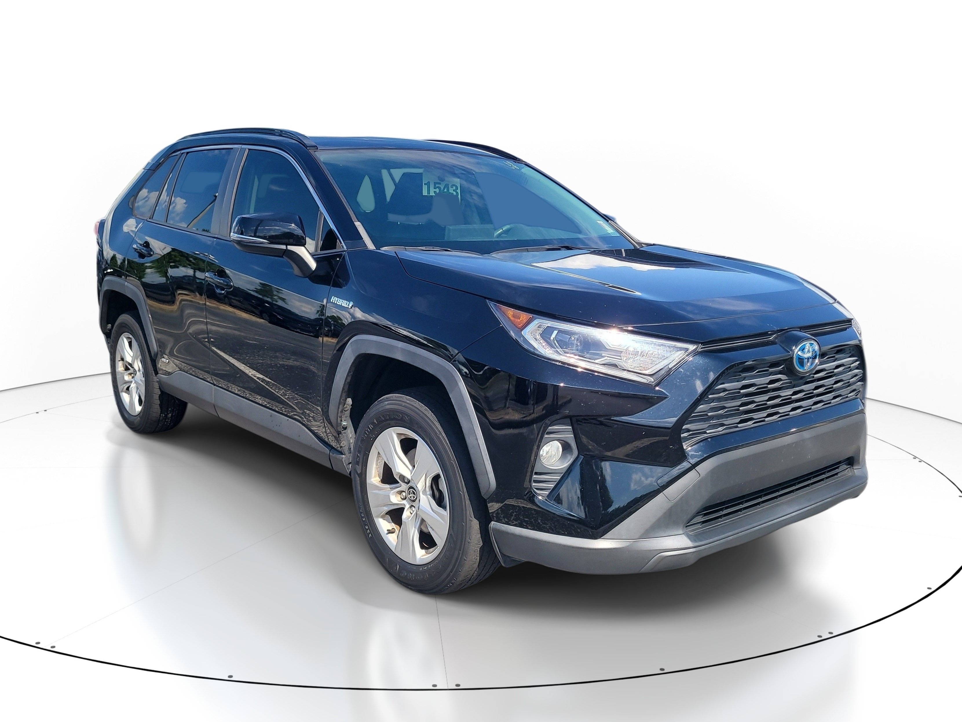 Used 2021 Midnight Black Metallic Toyota Hybrid XLE image 1