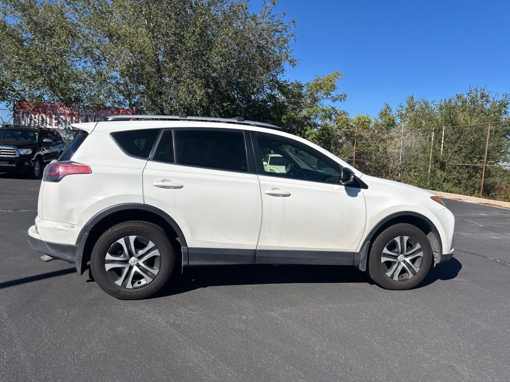 Used 2016 Super White Toyota LE image 5