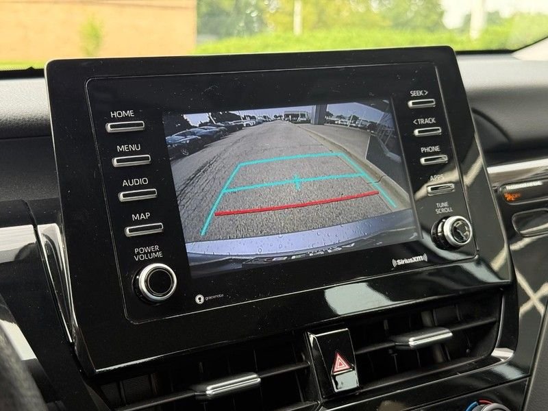 Used 2021 Celestial Silver Metallic Toyota LE image 24