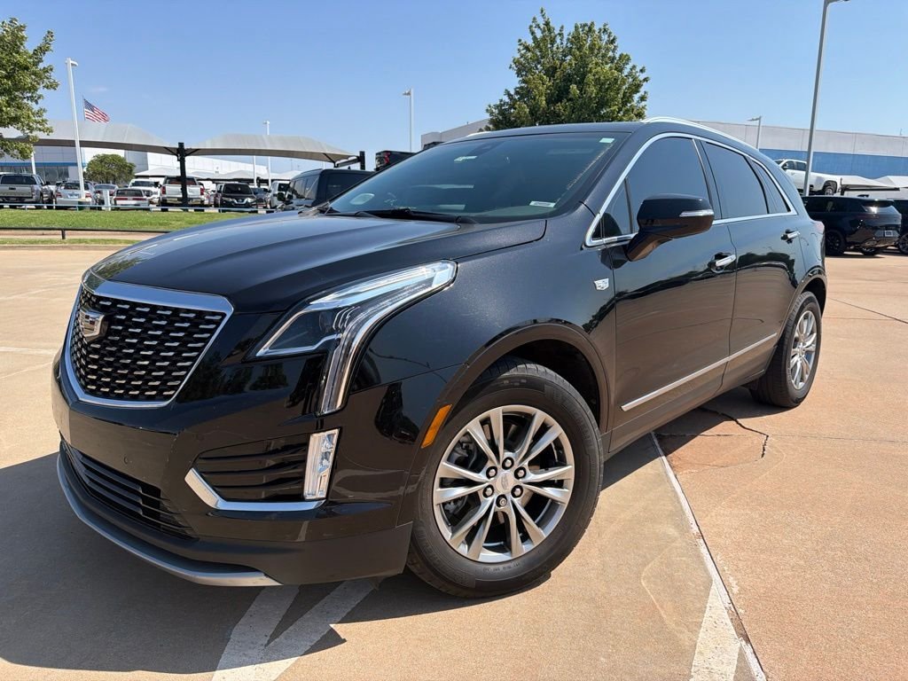 Used 2023 Black Cadillac Premium Luxury image 1