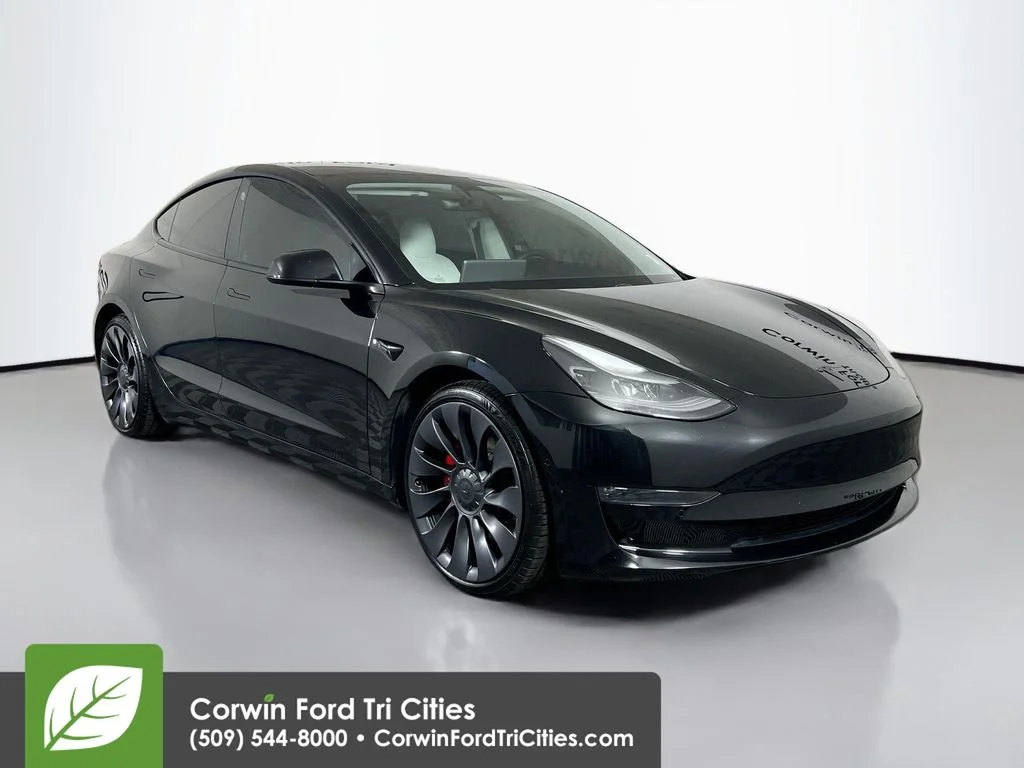 Used 2021 Black Tesla Performance image 1