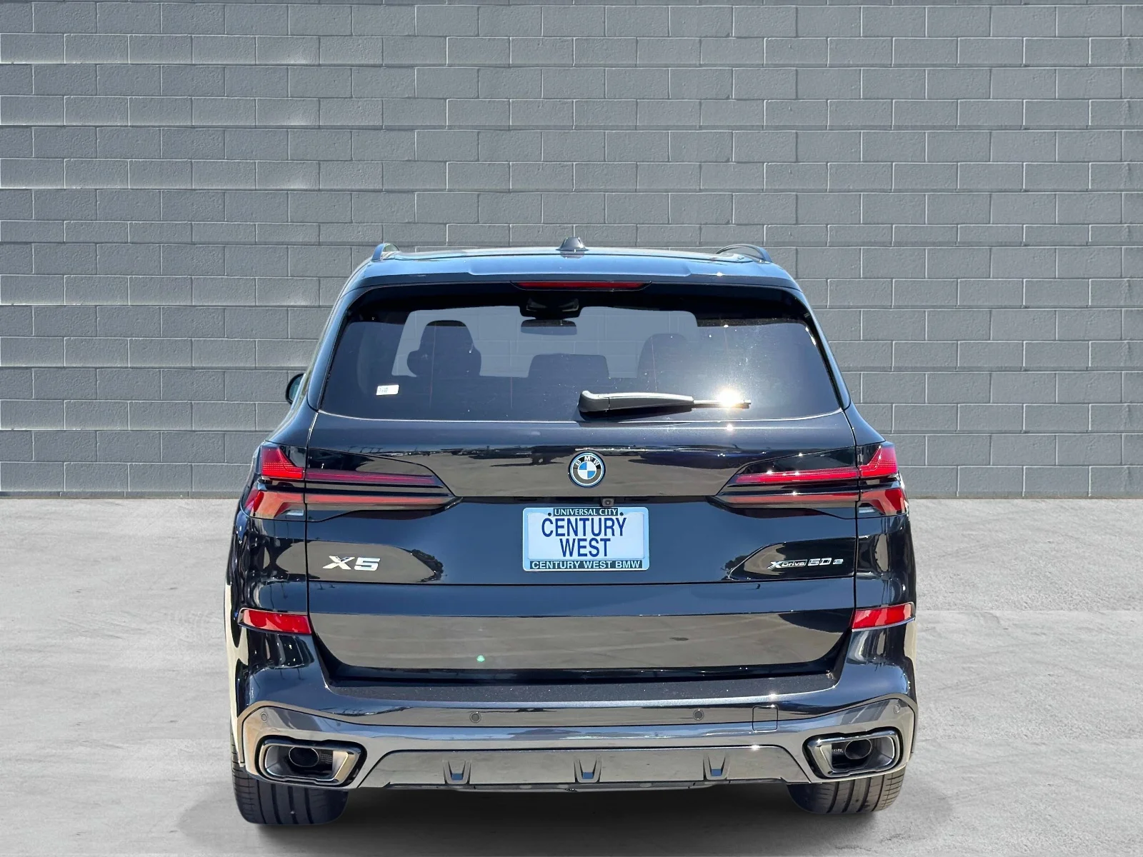 New 2026 Black Sapphire Metallic BMW xDrive50e image 4
