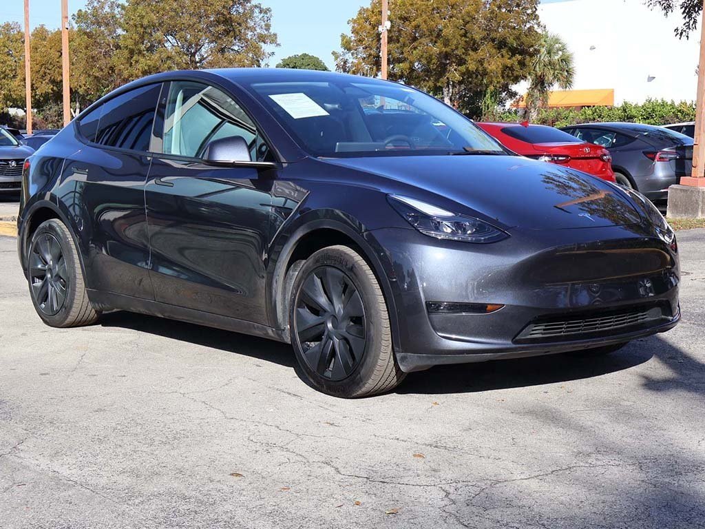 Used 2025 Tesla Model Y Long Range with VIN 7SAYGDED4SA372673 for sale in Miami, FL