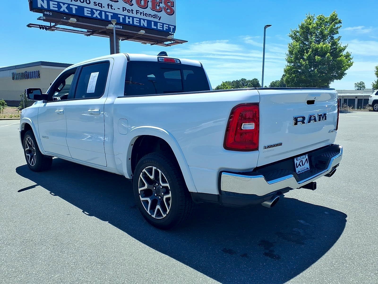 Used 2025 Bright White Clearcoat Ram Laramie Crew Cab 4x4 5