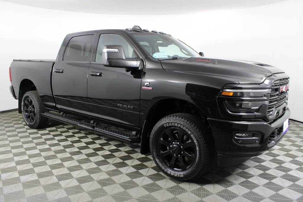 Used 2025 Diamond Black Ram Laramie image 1
