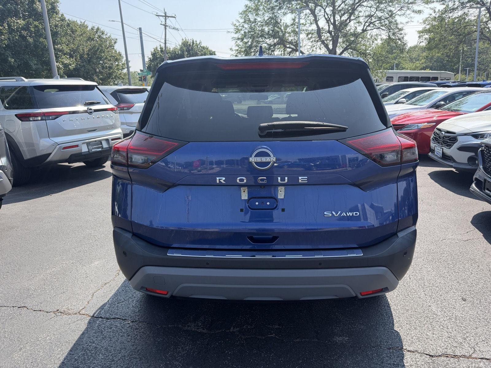 Used 2022 Caspian Blue Metallic Nissan SV image 5