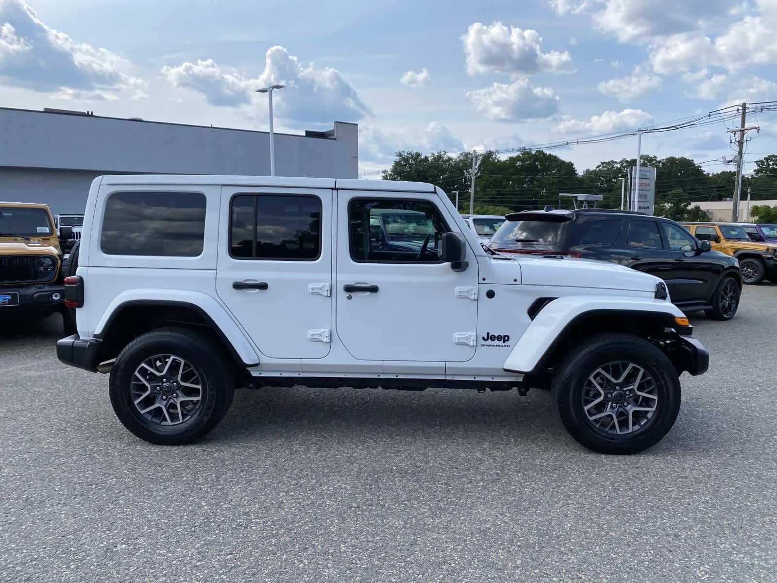Used 2026 Bright White Clearcoat Jeep Sahara image 2