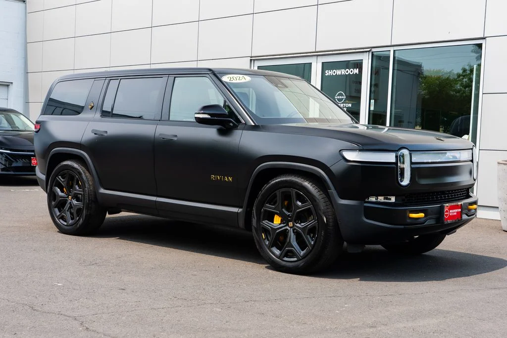 Used 2024 Black Rivian Adventure image 1