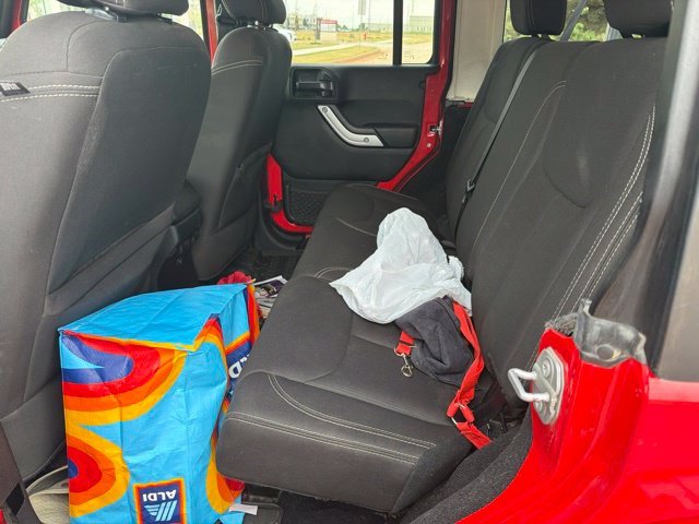 Used 2017 Red Jeep Unlimited Sahara image 10