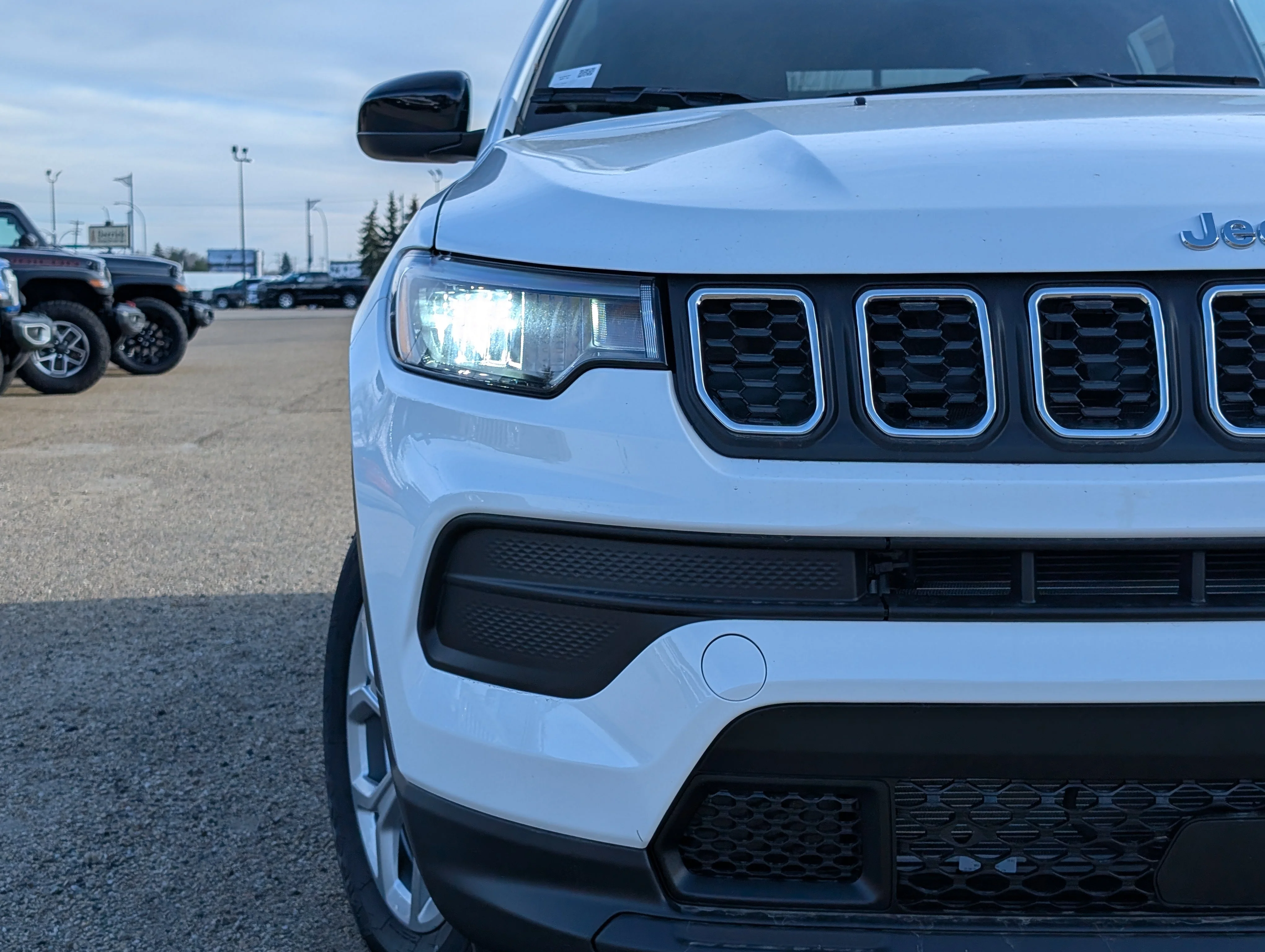 New 2026 Bright White Jeep Sport image 11