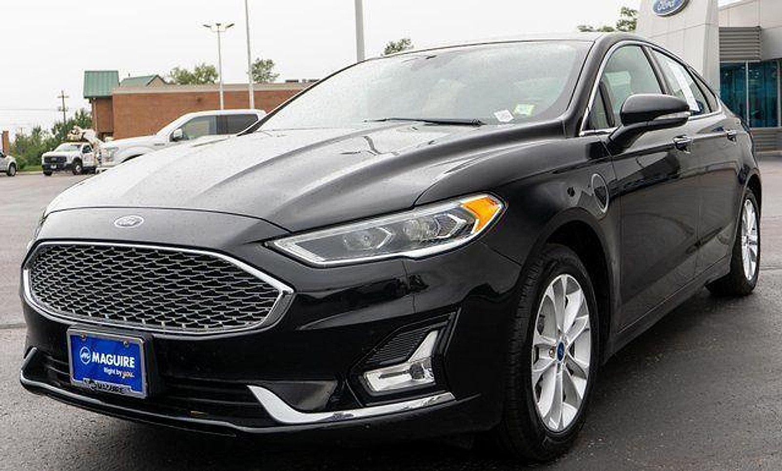 Used 2020 Agate Black Metallic Ford Plug-In Hybrid Titanium image 2