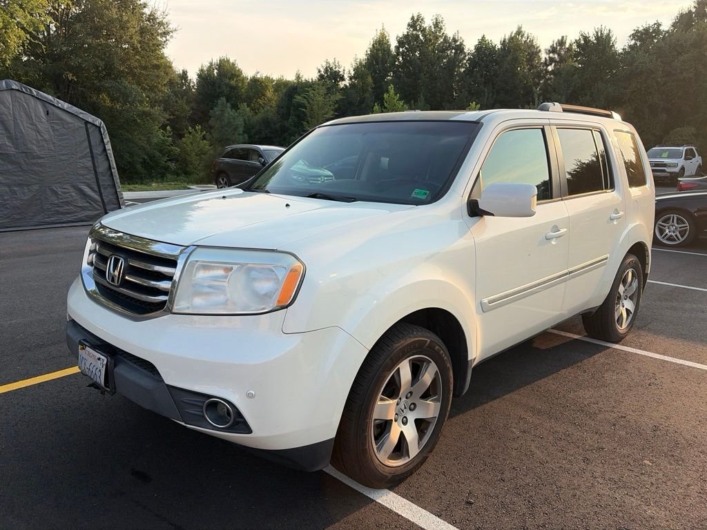 Used 2015 White Diamond Pearl Honda Touring image 1