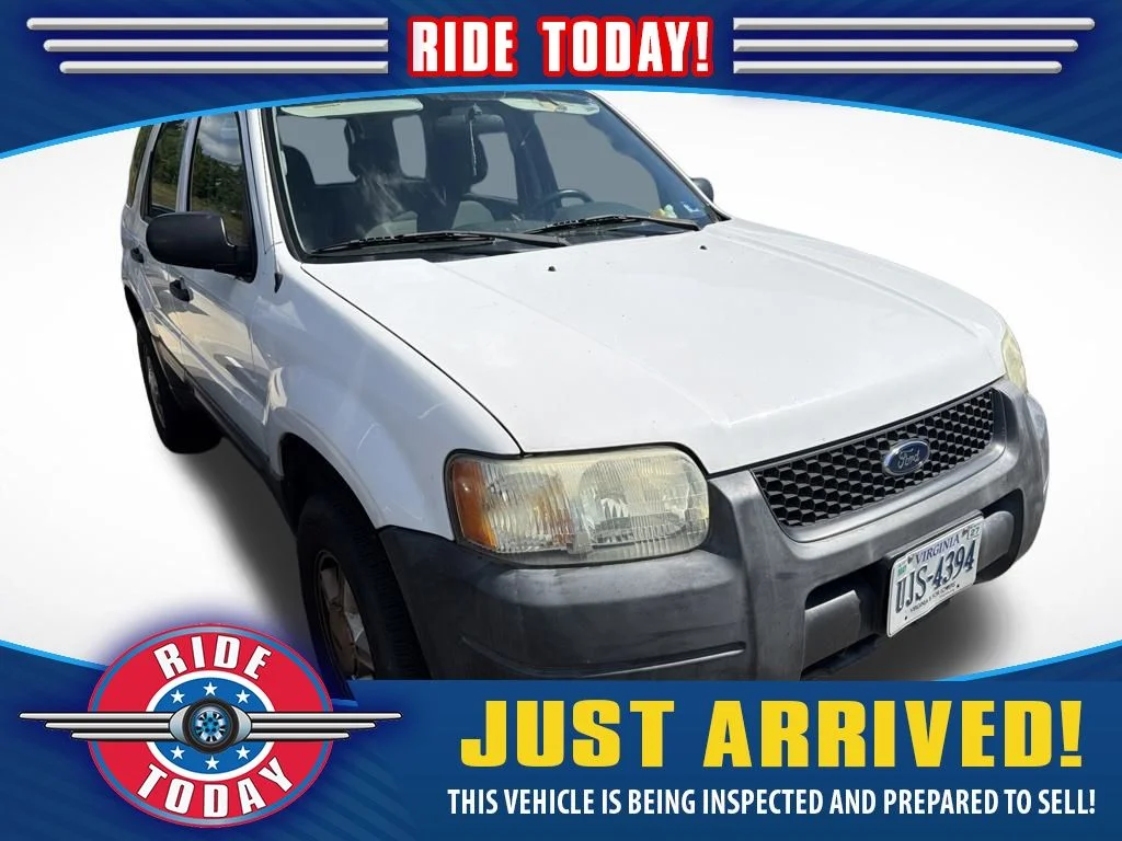 Used 2004 Oxford White Clearcoat Ford XLS image 1