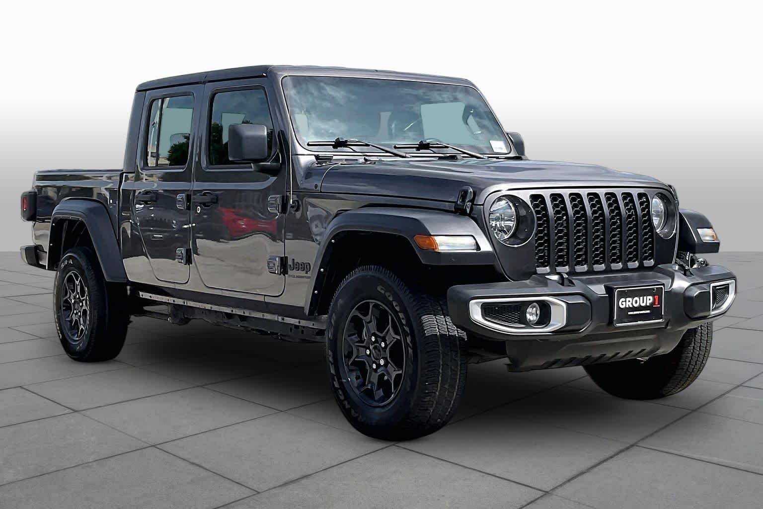 Used 2023 Granite Crystal Metallic Clearcoat Jeep Sport image 3
