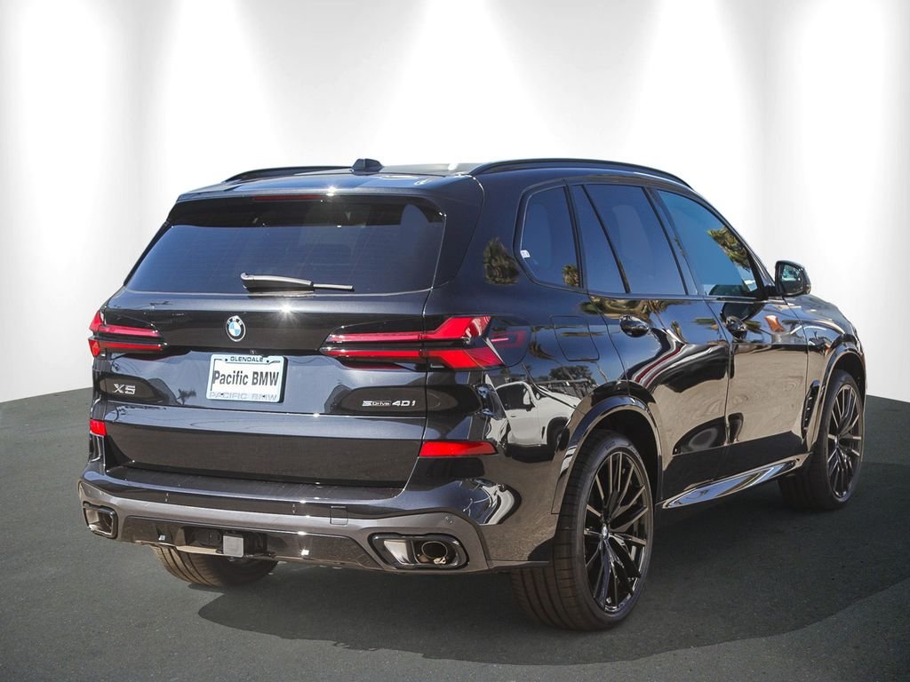 New 2026 Black Sapphire Metallic BMW sDrive40i image 6