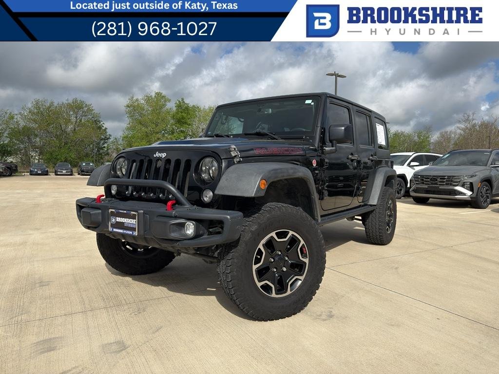 Used 2015 Black Clearcoat Jeep Rubicon Hard Rock image 1