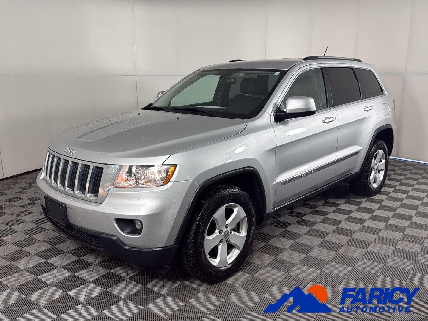 Used 2013 Bright Silver Metallic Jeep Laredo image 1