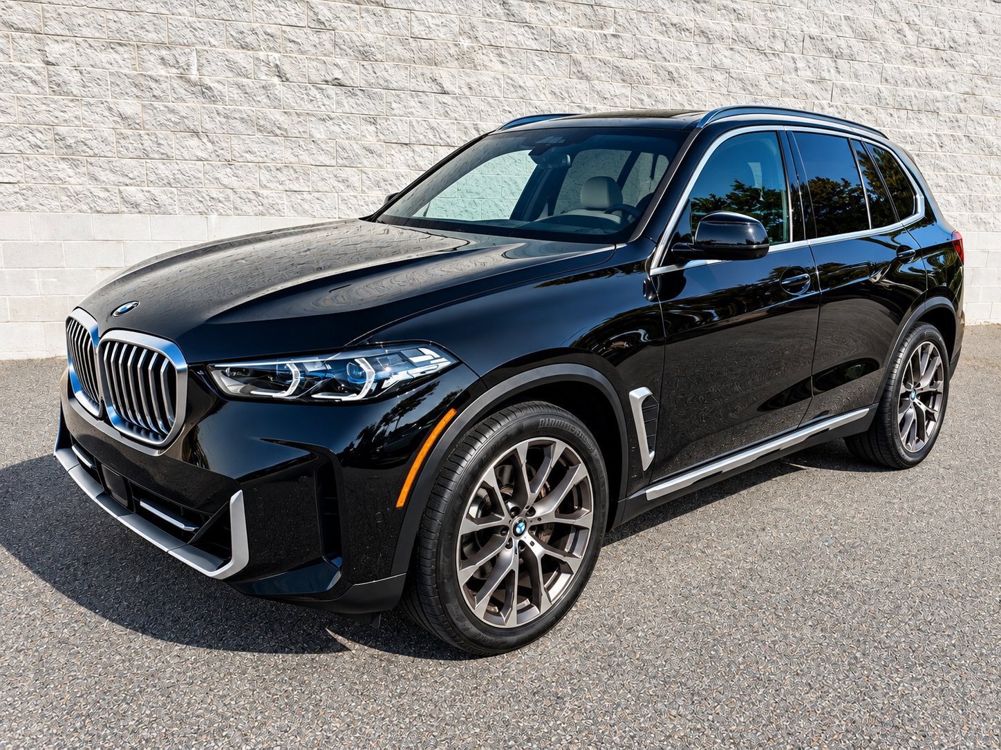 Certified Used 2025 Black Sapphire Metallic BMW xDrive40i image 1
