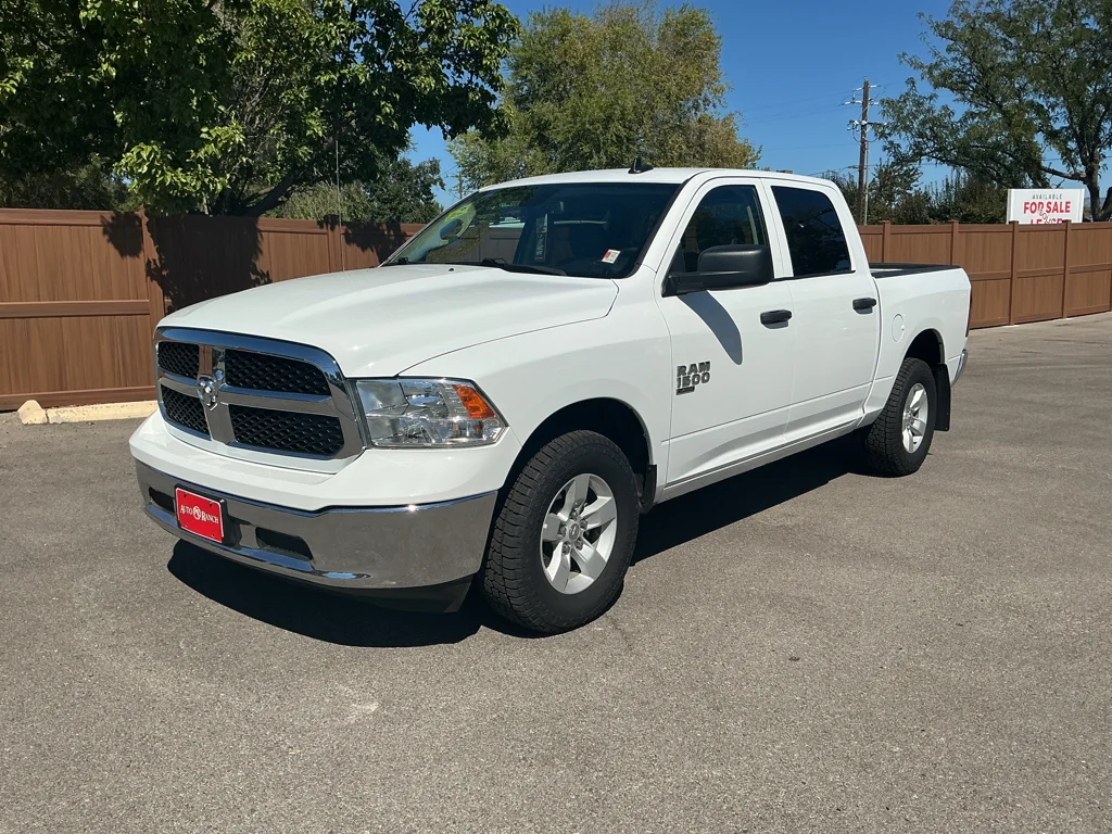 Used 2023 Bright White Clearcoat Ram SLT image 1
