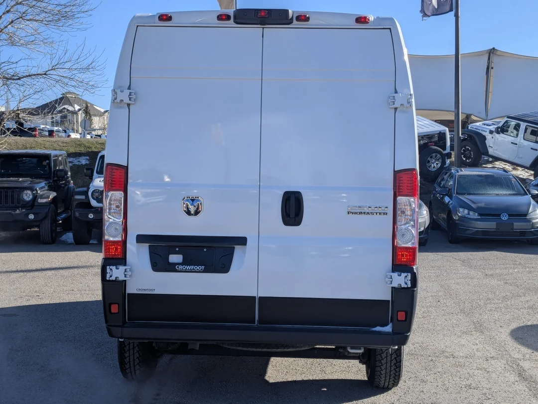 Certified Used 2025 White RAM Tradesman - - C/V HR 136 WB - Pkg 22B - Convenience Grp - Cargo Partition - Wall Paneling & More! image 7