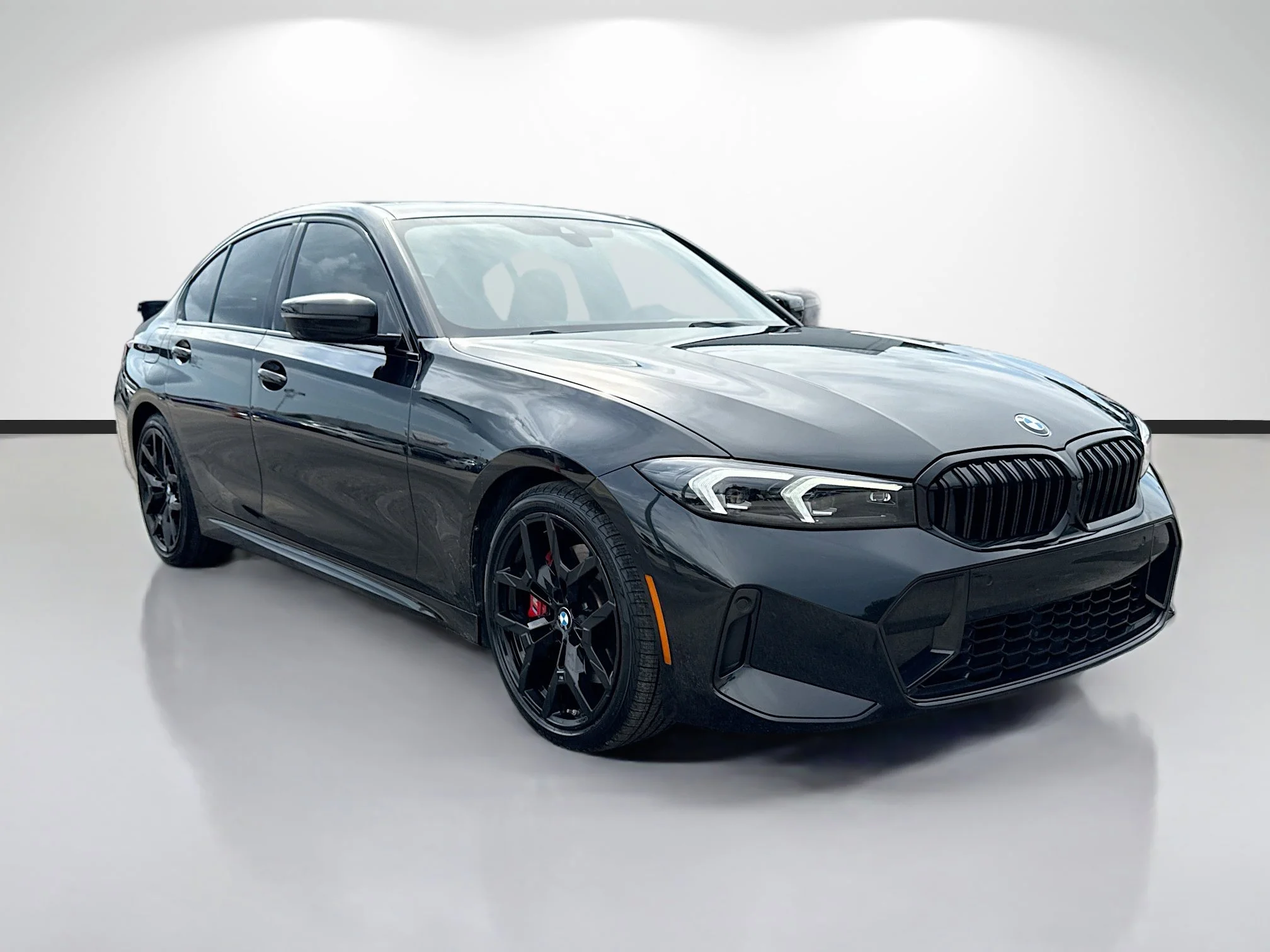 Used 2025 Black Sapphire Metallic BMW 330i image 1