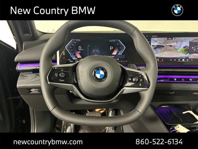 New 2027 Black Sapphire Metallic BMW 550e xDrive image 14