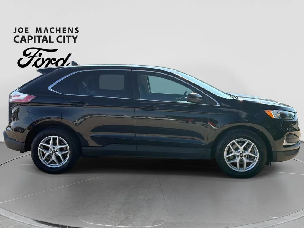 Used 2024 Agate Black Metallic Ford SEL image 3