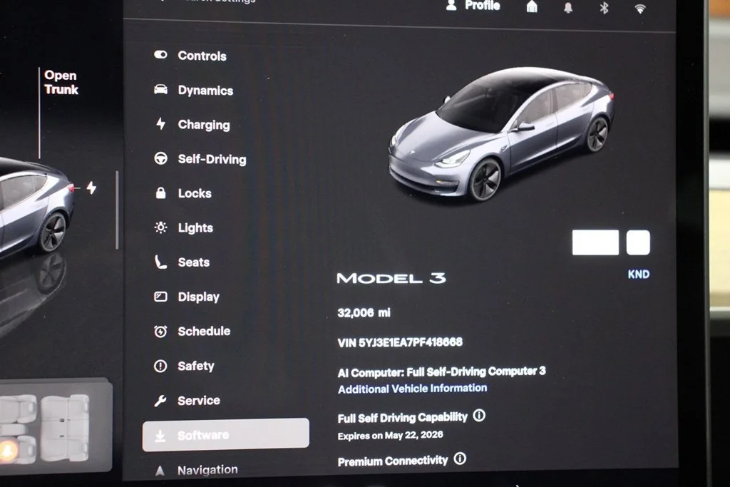 Used 2023 Solid Black Tesla Base image 15