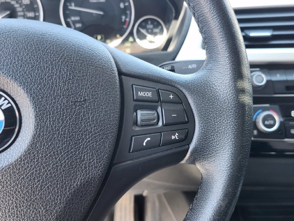 Used 2018 Gray BMW 320i xDrive image 29