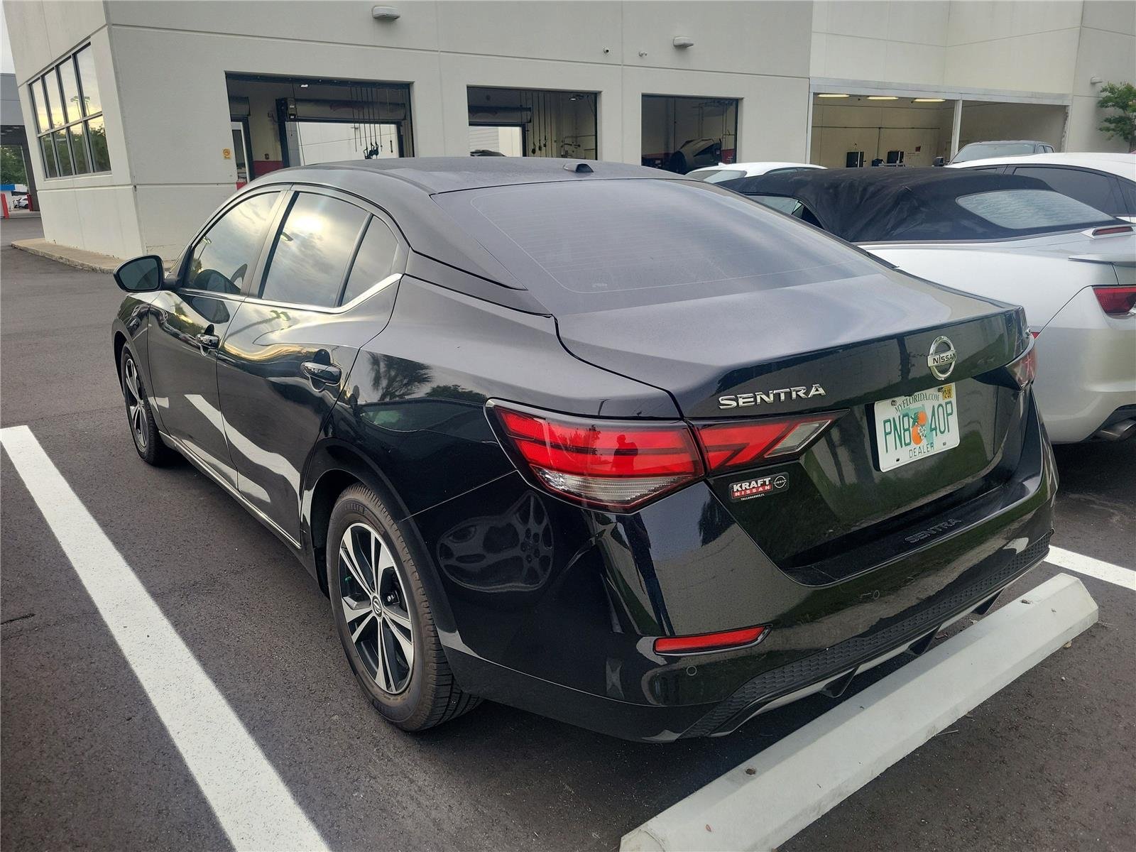 Used 2022 Super Black Nissan SV image 2