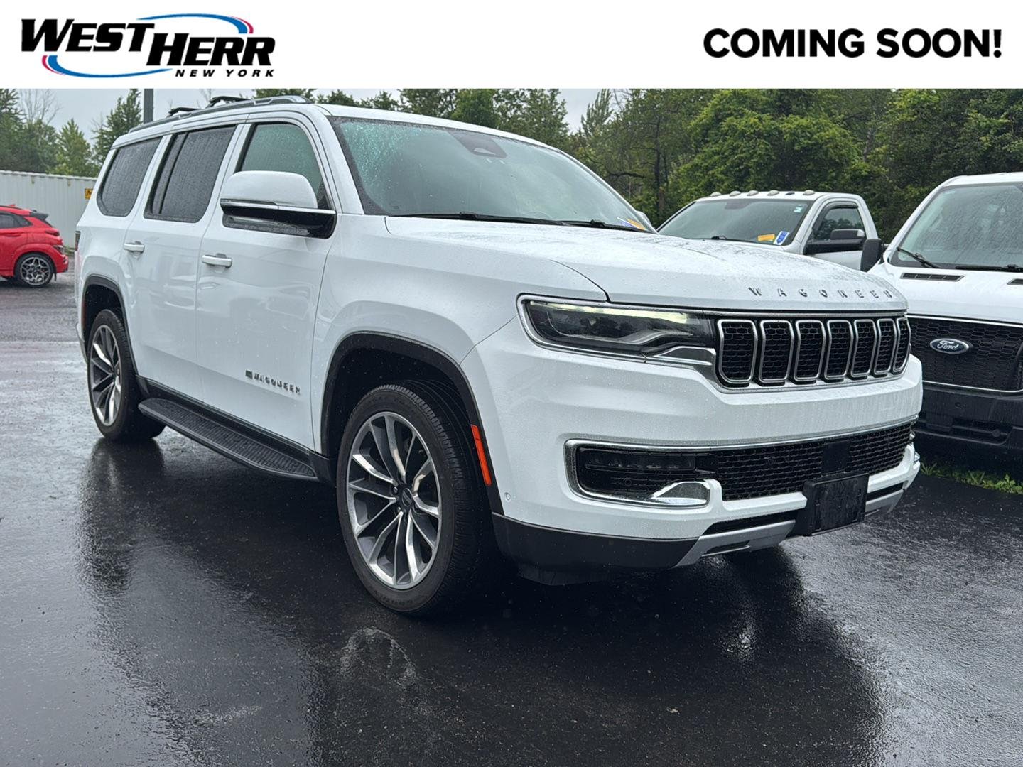 Used 2022 Bright White Clearcoat Jeep Series II image 1
