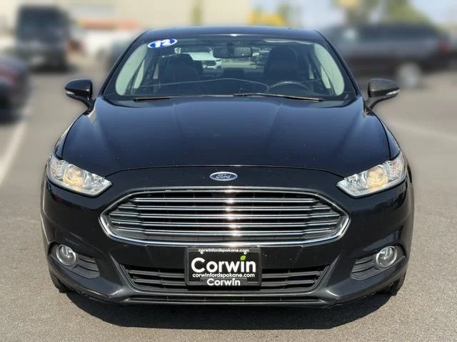 Used 2014 Tuxedo Black Metallic Ford SE image 6