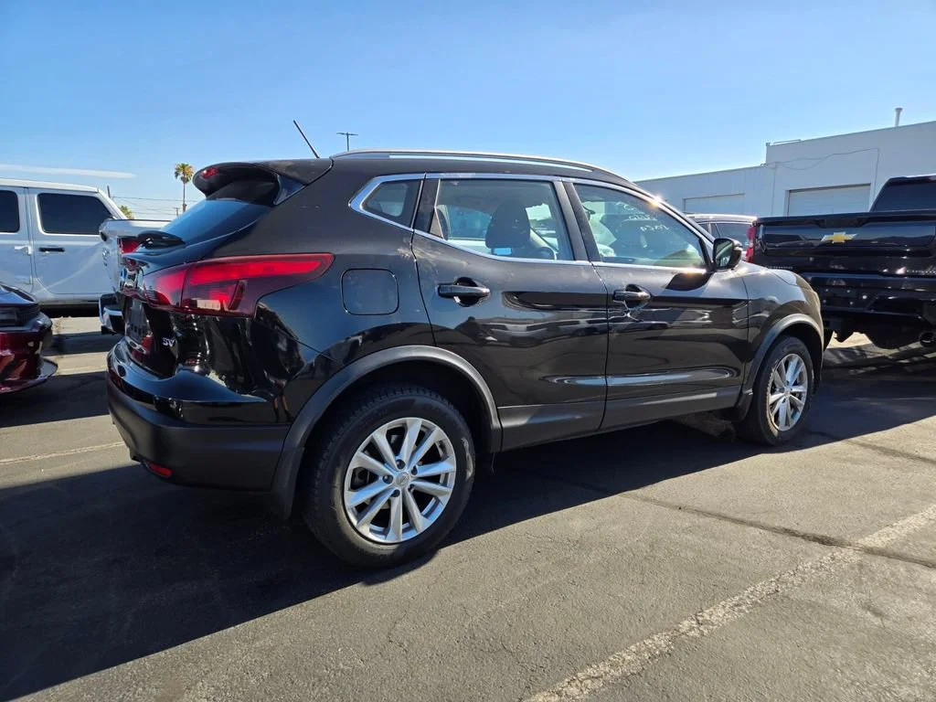 Used 2018 Magnetic Black Nissan SV image 2