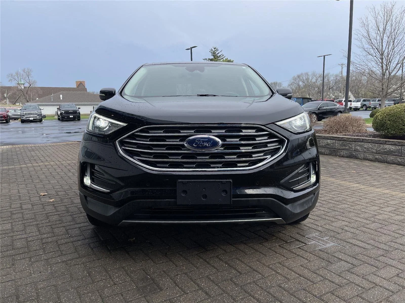 Used 2024 Agate Black Metallic Ford Titanium image 8