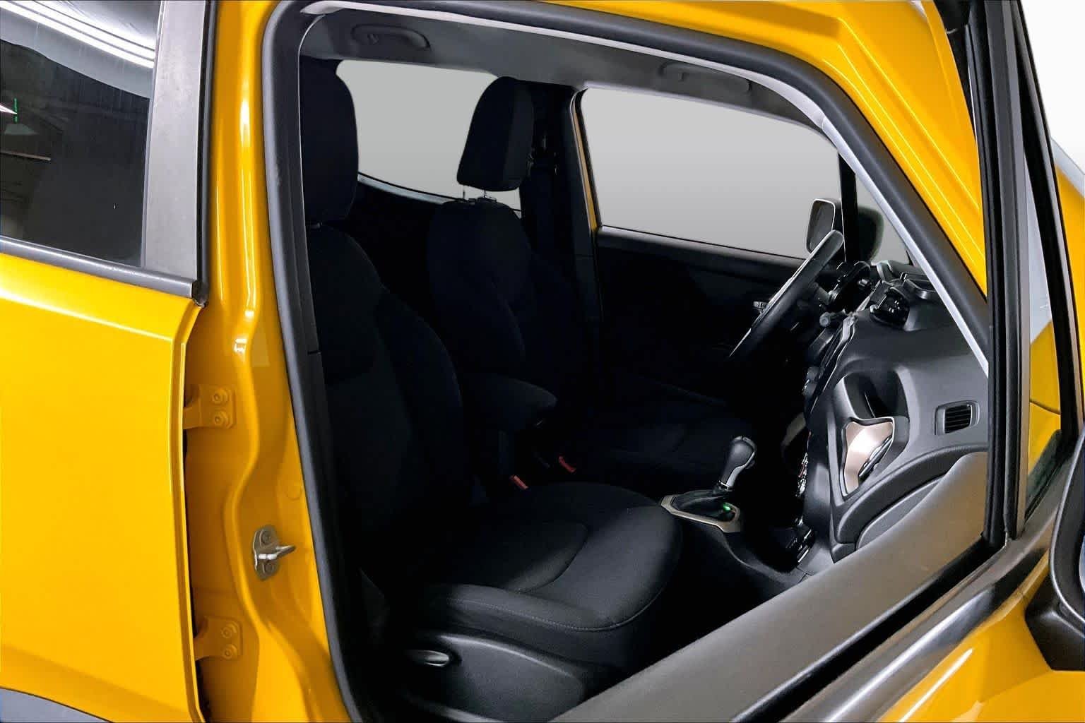 Used 2017 Solar Yellow Jeep Sport image 8