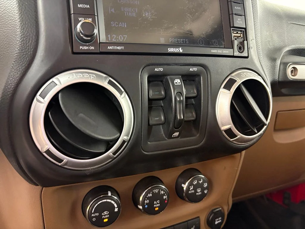 Used 2013 Red Jeep Unlimited Sahara image 30