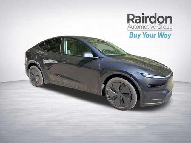 Used 2026 Solid Black Tesla Standard Range image 1