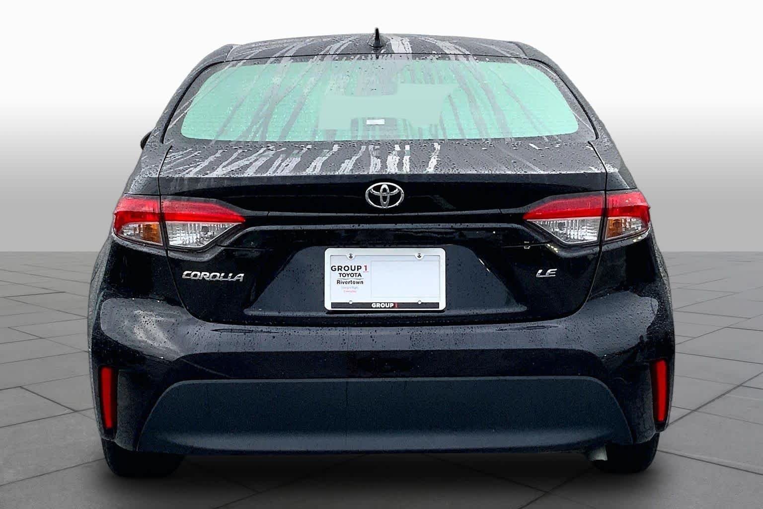Used 2024 Midnight Black Metallic Toyota LE image 5
