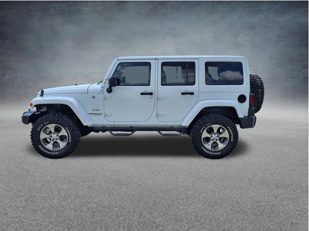 Used 2016 White Jeep Unlimited Sahara image 5